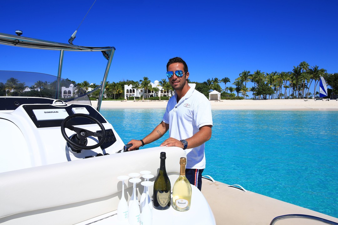 The Agency — captain with champagne service